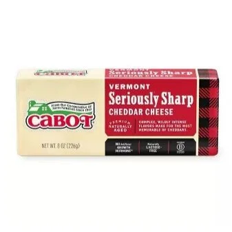 Vermont Seriously Sharp Cheddar Cheese from Cabot, 8 oz package, featuring bold flavors and natural aging for a rich taste experience. Lactose-free and made from quality ingredients.